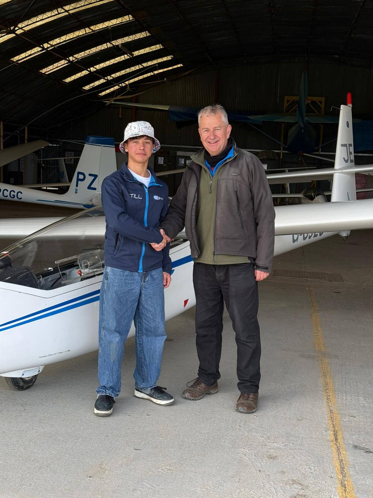 Myself and my instructor in the hangar